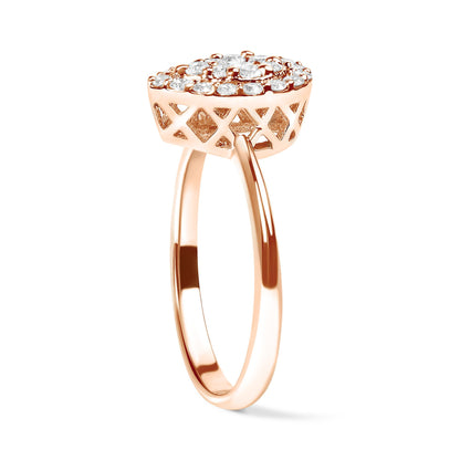Side angle view of a rose-colored ring featuring a raised setting with multiple round white gemstones in prong settings and an intricate lattice design on the side.
