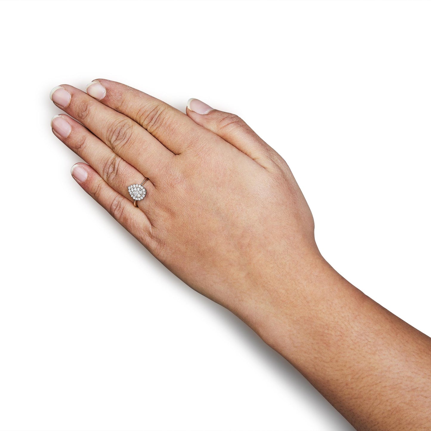 Close-up angle of a hand wearing a rose-colored ring with a cluster of round white gemstones in a prong setting.