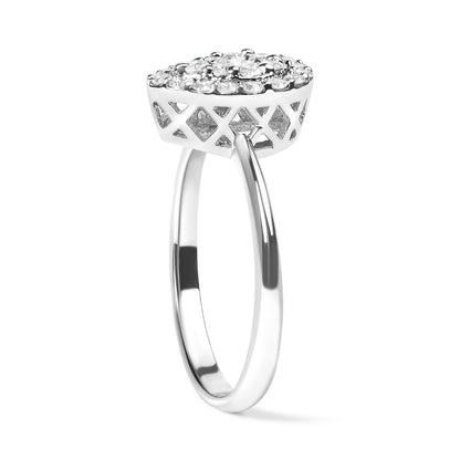 Side angle of a white metal ring with a raised round cluster of small white gemstones in prong settings and lattice design on the gallery.
