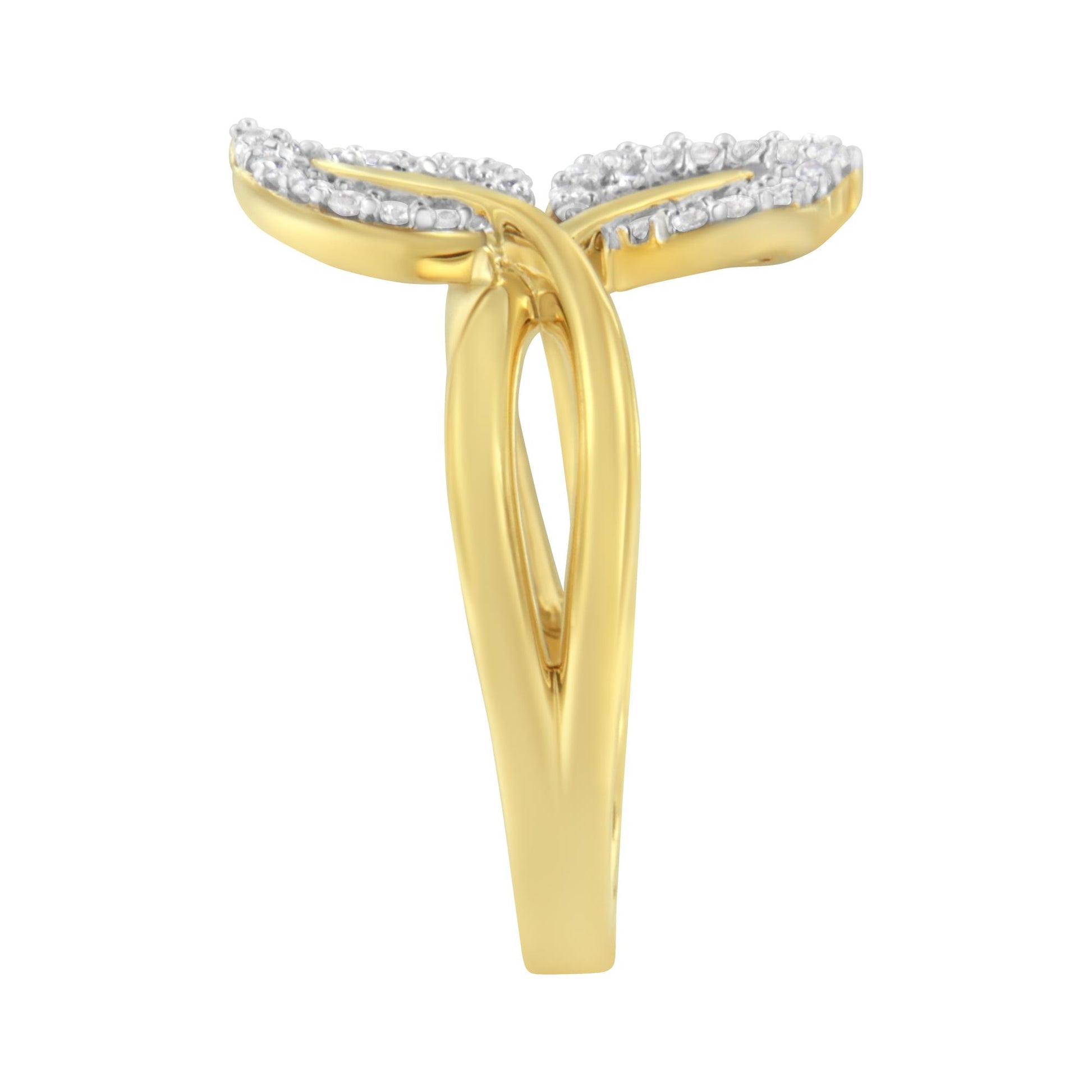 Front angle view of a yellow ring with an open double band design, featuring white round gemstones in prong settings and white baguette gemstones in channel settings along the top edges.