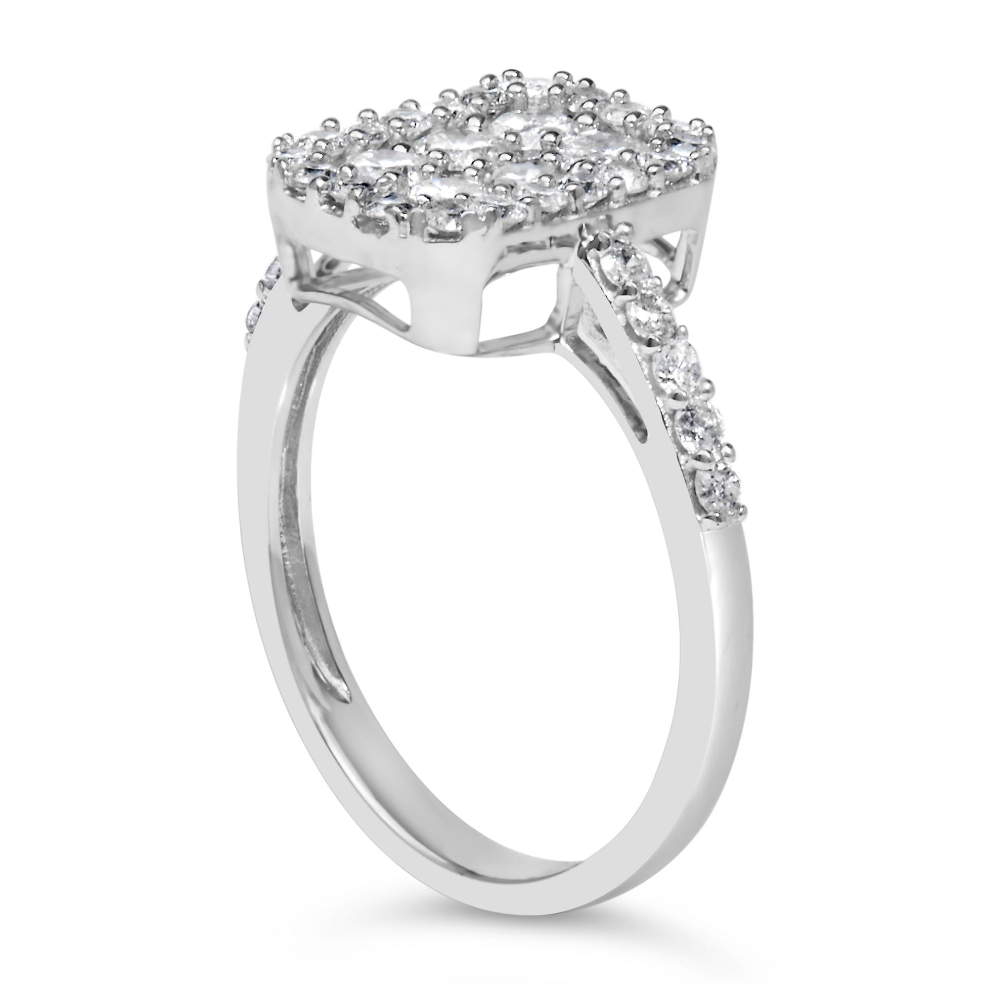 White metal ring with a square cluster of small white round gemstones in prong settings, viewed from a side angle showing the band accented with additional white round gemstones.
