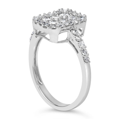 White metal ring with a square cluster of small white round gemstones in prong settings, viewed from a side angle showing the band accented with additional white round gemstones.