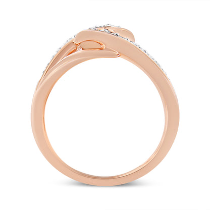 Side view of a rose metal ring with multiple small white round gemstones set in prongs along the band.