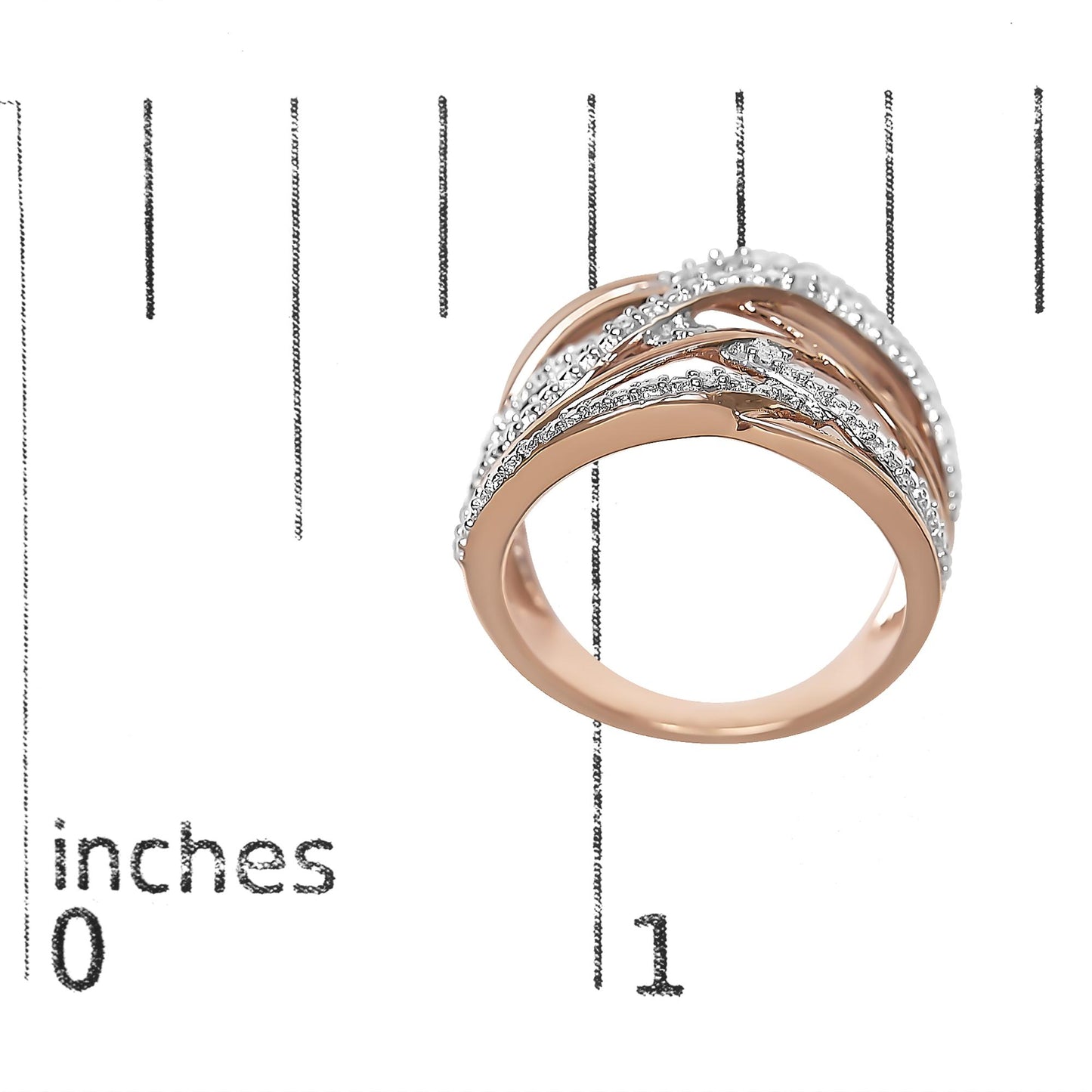 Rose metal ring with multiple overlapping bands, adorned with five white round gemstones in pave setting, shown on a ruler for size reference, angled top view.
