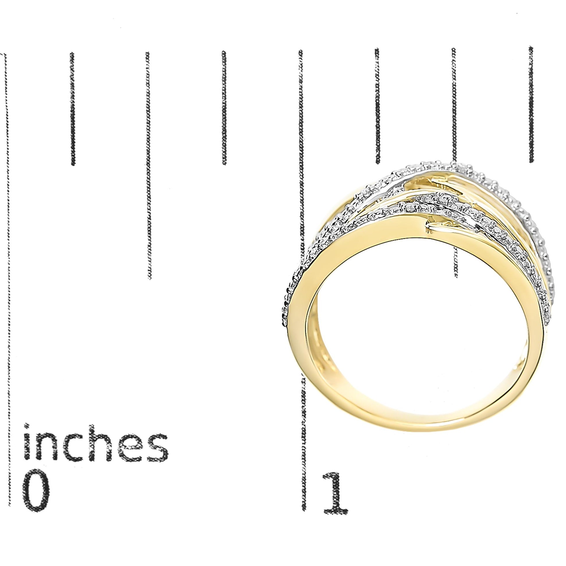 Yellow ring with overlapping bands featuring white round gemstones in pave setting, shown from a side angle on a ruler for size reference.