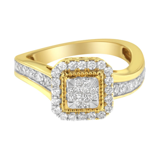 Yellow ring with a square cluster of white princess-shaped gemstones in the center surrounded by a halo of round white gemstones, channel-set round white gemstones along the split shank, shown at a slight angle.