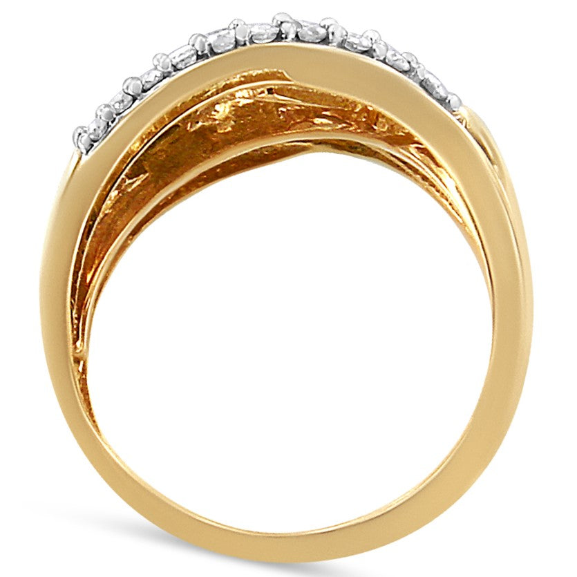 Close-up side view of a yellow and white ring featuring white round gemstones in prong settings and white baguette gemstones in a channel setting.