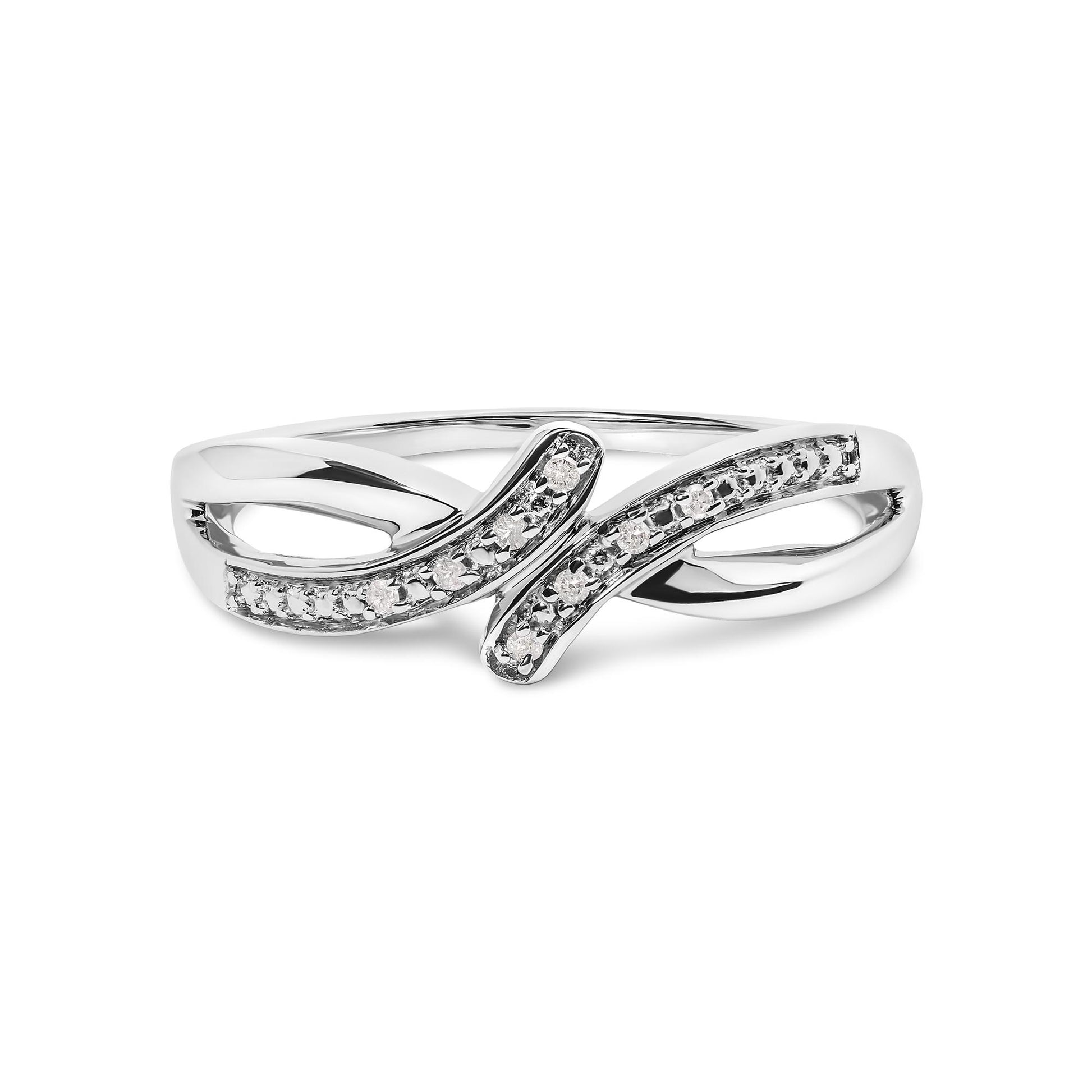 Front angle view of a white metal ring featuring two overlapping curved bands, each adorned with round white gemstones in prong settings.