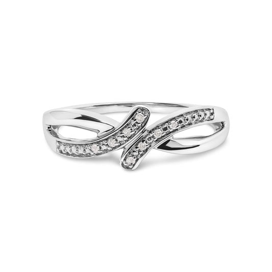 Front angle view of a white metal ring featuring two overlapping curved bands, each adorned with round white gemstones in prong settings.