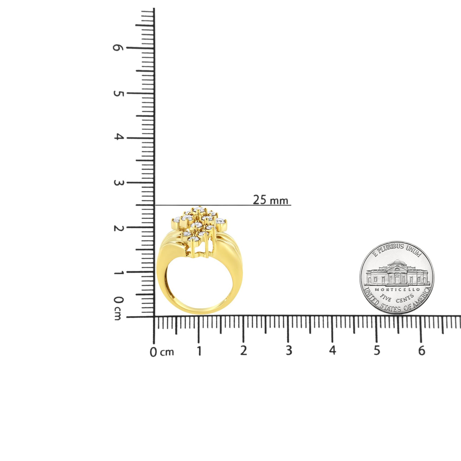 Yellow ring with cluster of round white gemstones in prong settings, shown from front angle on a ruler and next to a coin for size reference.