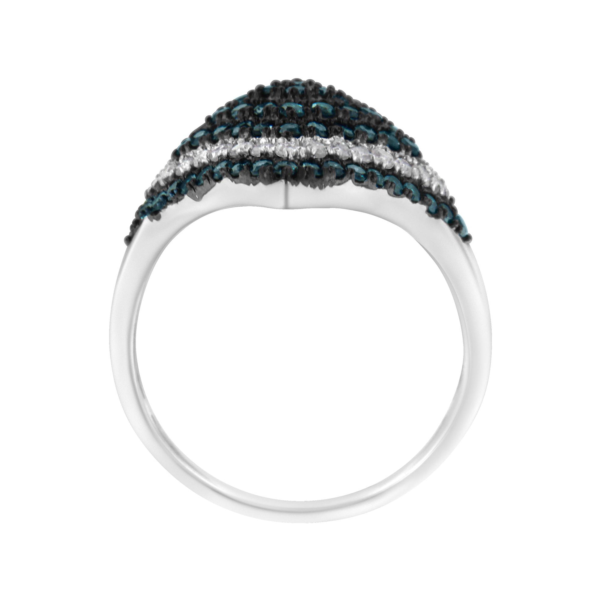 White metal ring with rows of round blue and white gemstones in prong settings, viewed from the front angle.