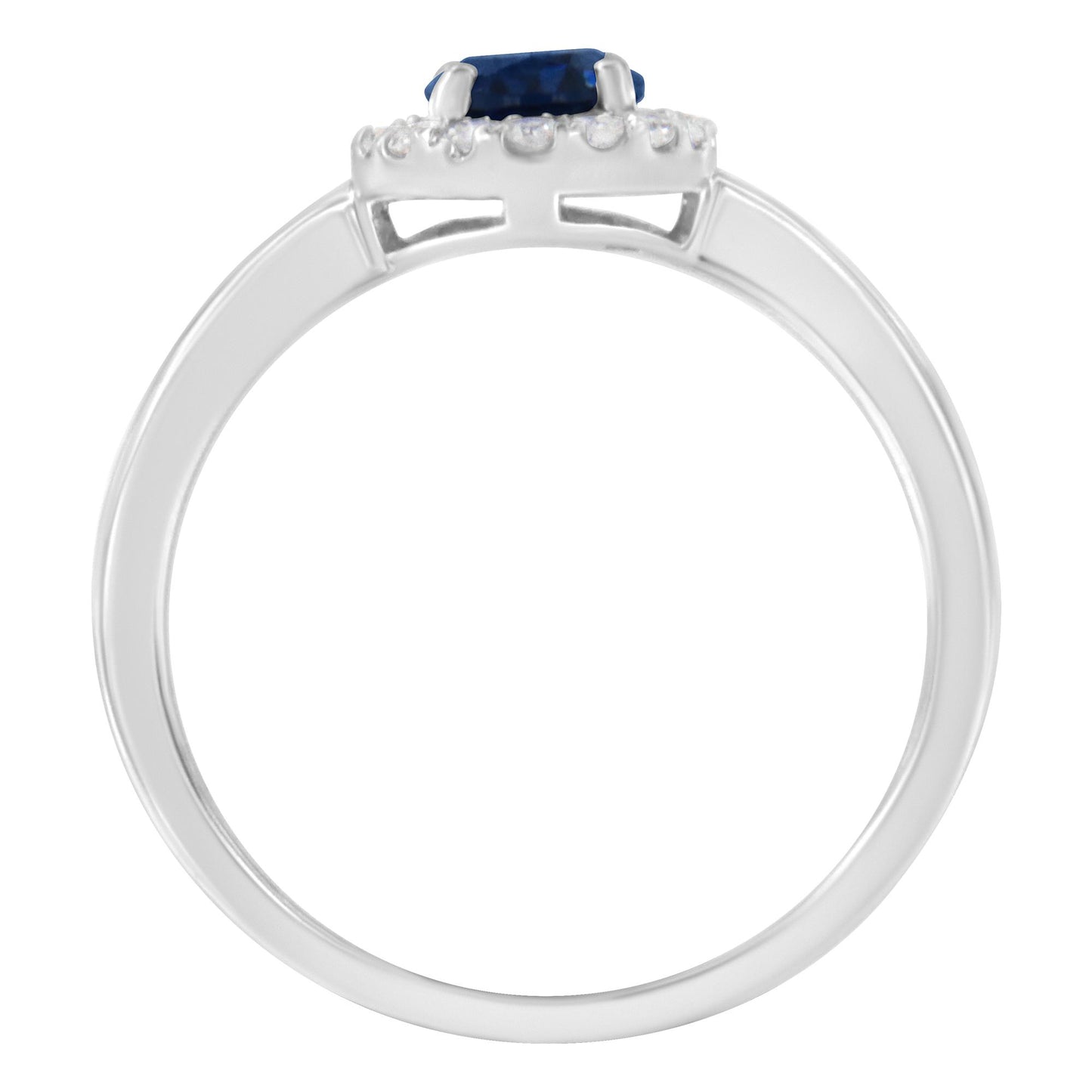 Side view of a white metal ring featuring an oval-shaped blue gemstone in a prong setting, surrounded by multiple round white gemstones also in prong settings.