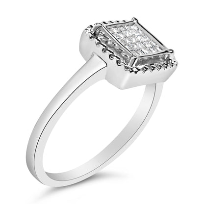 Close-up angled view of a white metal ring with a square top featuring multiple princess-shaped white gemstones in an invisible setting.
