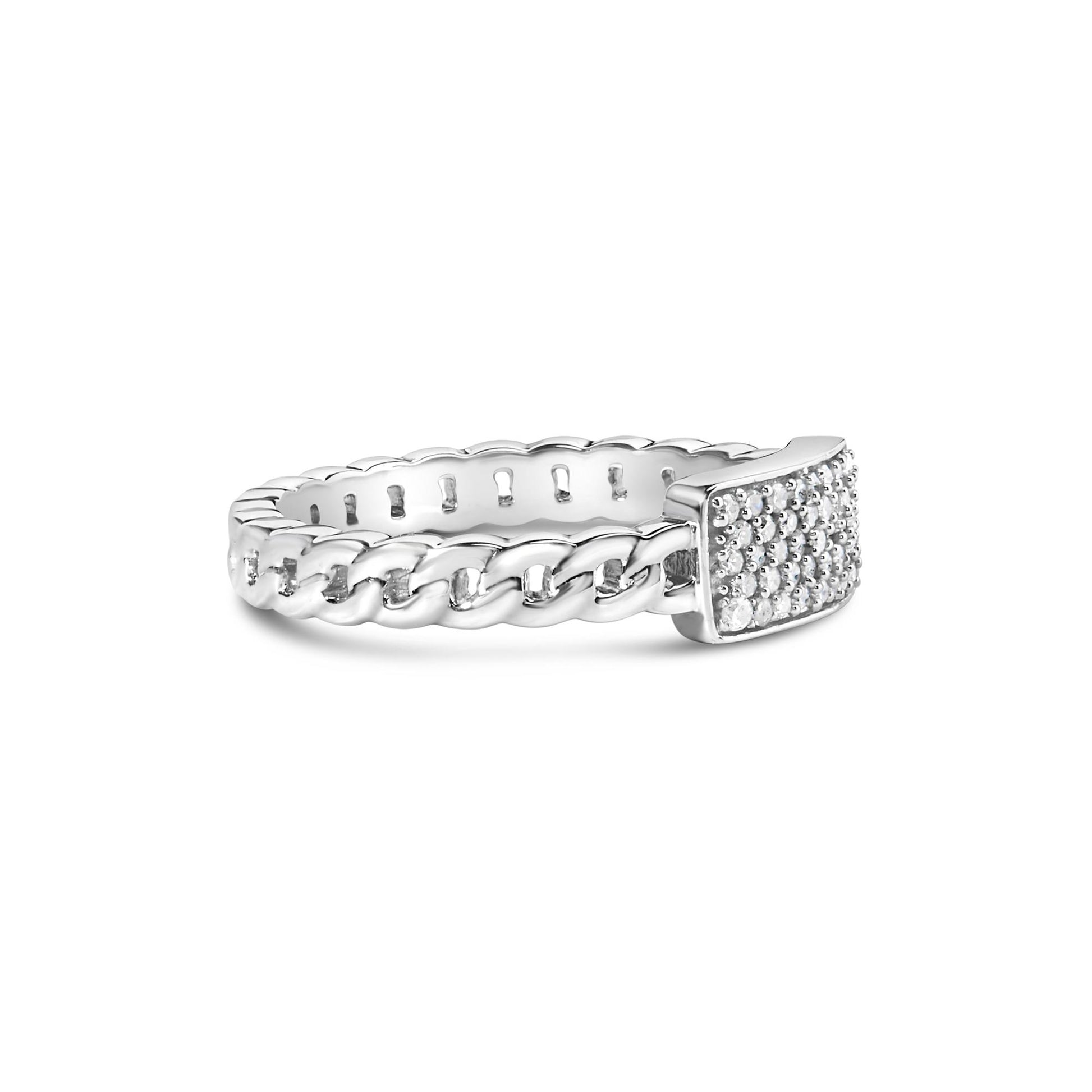 White metal ring with a braided band and a rectangular top set with multiple round white gemstones, shown from a side angle.