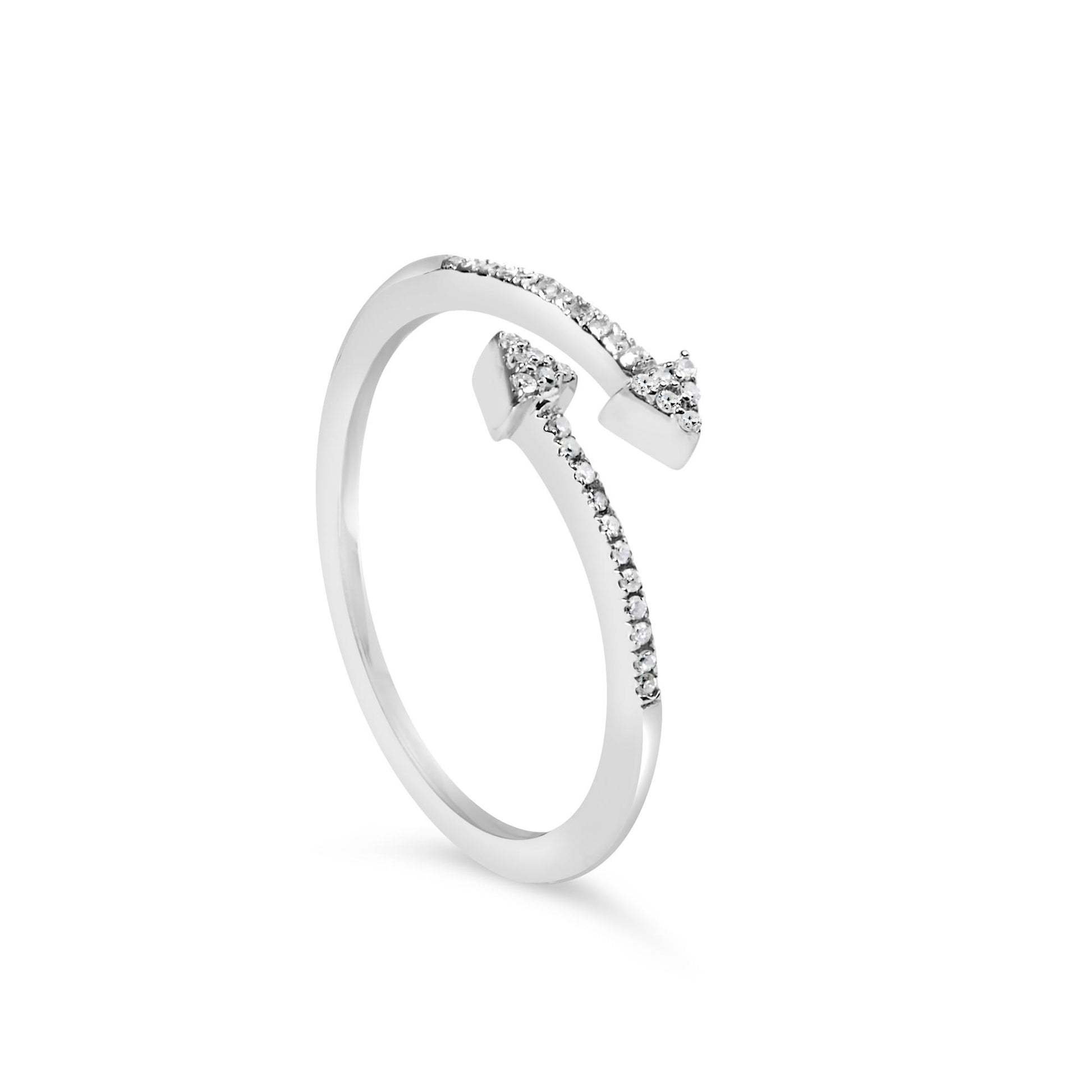 White metal open-ended ring with pointed tips, each set with small round white gemstones, shown in a front angled view.