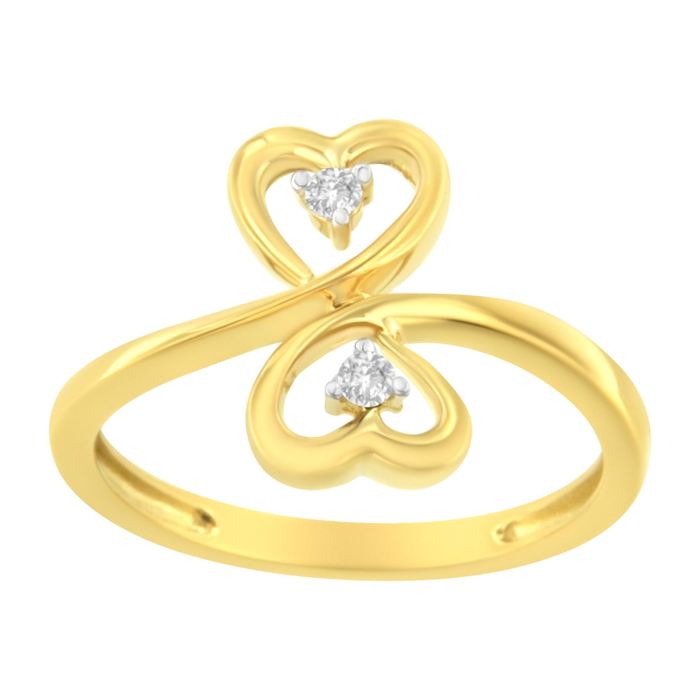 Yellow metal ring with two heart-shaped loops each holding a round prong-set brownish gemstone, shown in a front angled close-up.