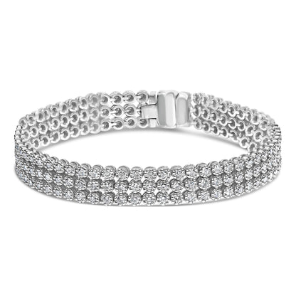 White metal bracelet with three rows of round white gemstones in prong settings, shown from a front angle.