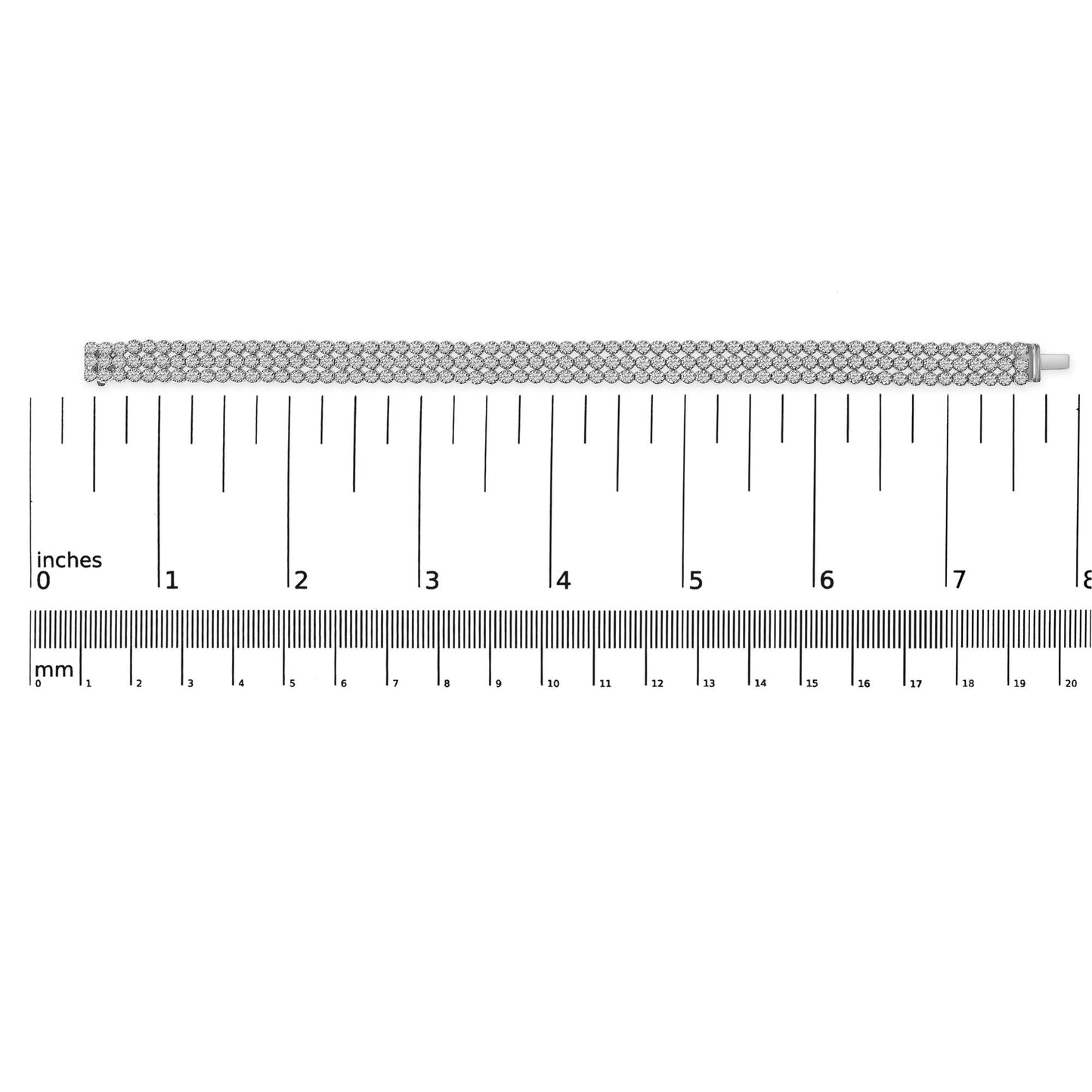 Straight-on shot of a white metal bracelet with multiple rows of round white gemstones in prong settings, displayed flat on a ruler for size reference.