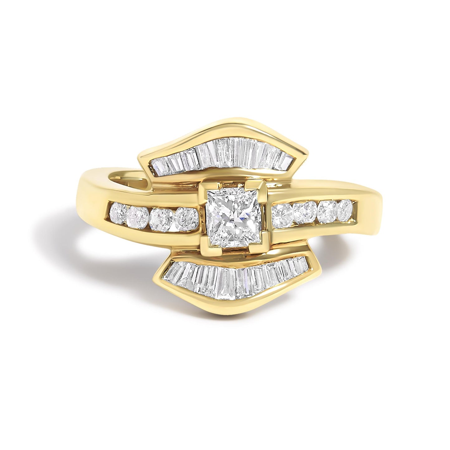 Close-up front angle of a yellow ring featuring a central princess-shaped white gemstone in a prong setting, flanked by round white gemstones in a channel setting, with two curved rows of baguette-shaped white gemstones in channel settings above and below the center.