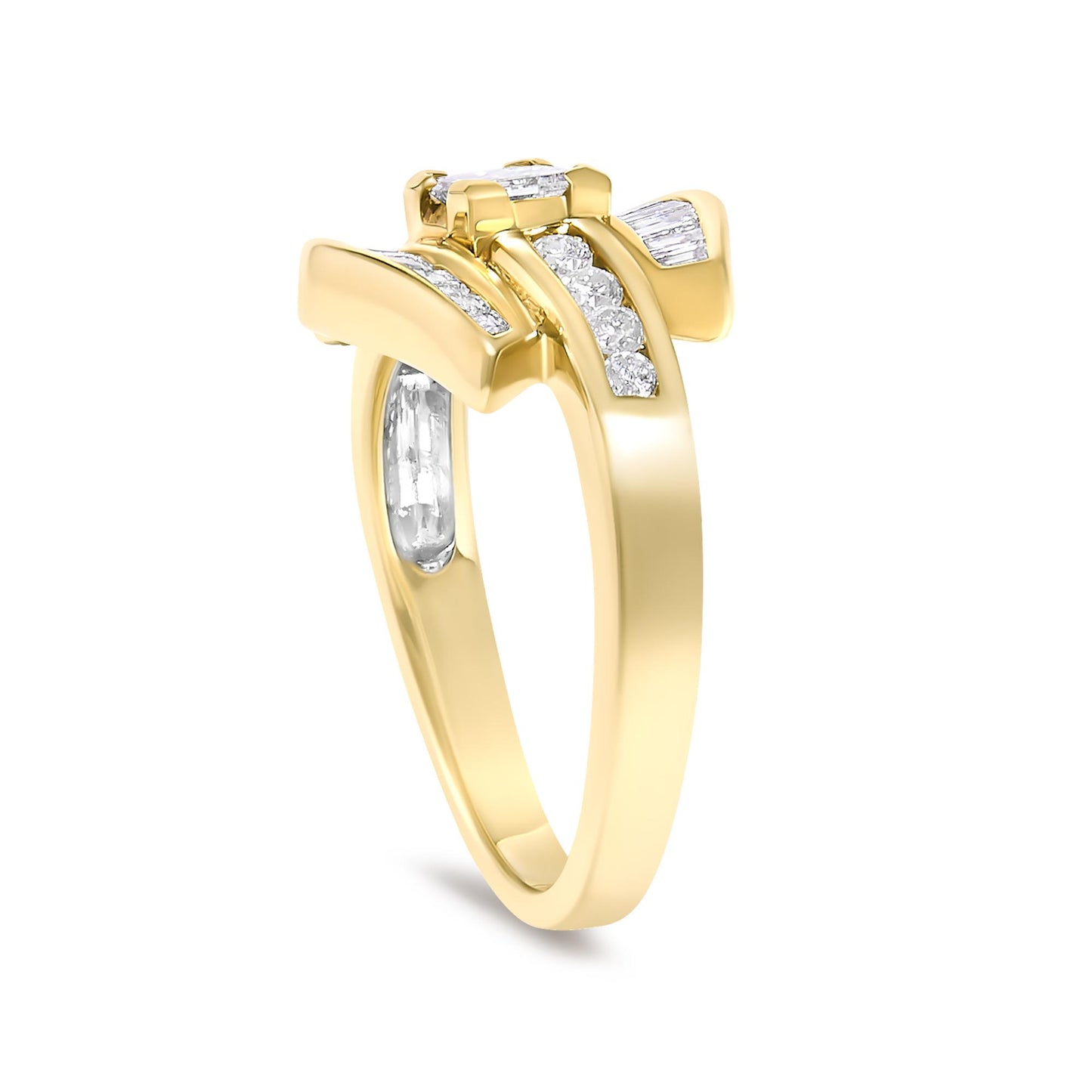 Close-up angled view of a yellow ring featuring one princess shaped white gemstone in a prong setting at the center, flanked by multiple white baguette and round gemstones in channel settings along the band.