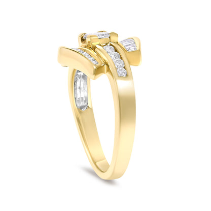 Close-up angled view of a yellow ring featuring one princess shaped white gemstone in a prong setting at the center, flanked by multiple white baguette and round gemstones in channel settings along the band.