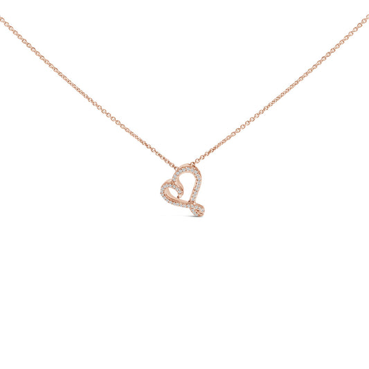 Close-up front view of a rose-colored necklace with a heart-shaped pendant outlined with round white gemstones in bezel settings.