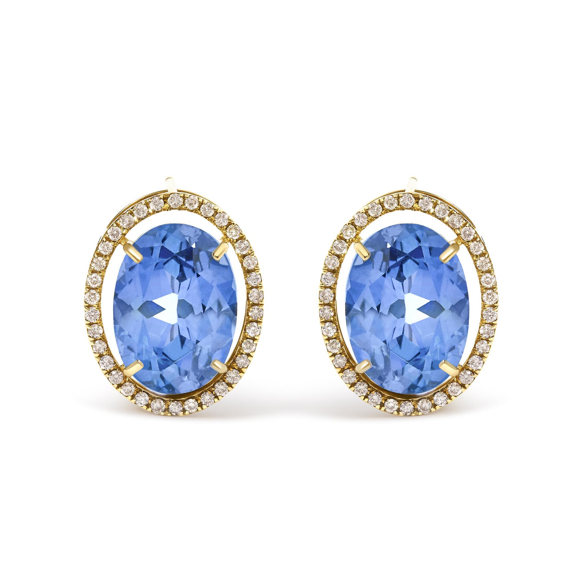 Close-up front view of yellow metal earrings featuring large oval blue gemstones surrounded by a halo of small round white gemstones in prong settings.