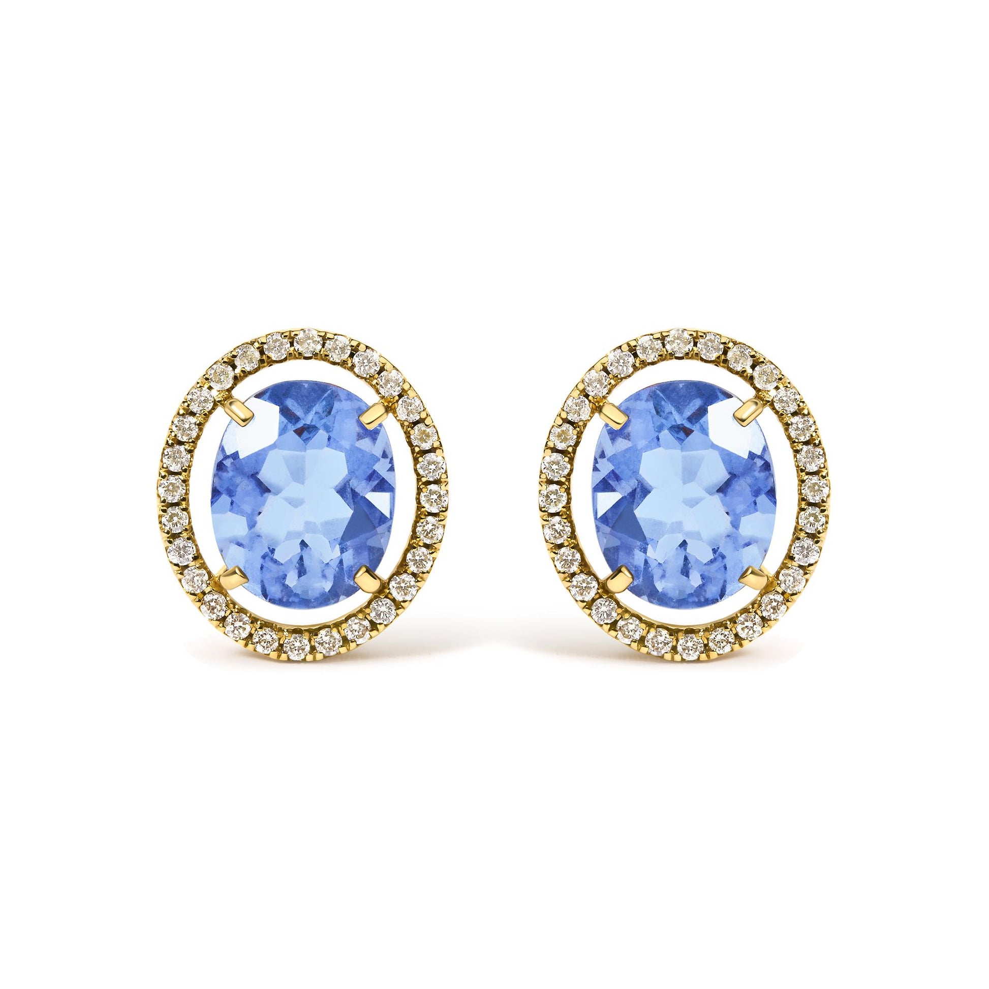 Close-up front view of yellow metal earrings featuring large oval blue gemstones at the center, surrounded by a halo of small round white gemstones in prong settings.