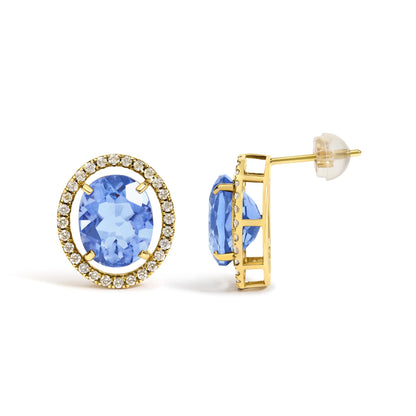 Close-up front and side view of yellow earrings featuring a central oval blue gemstone surrounded by a halo of small white round gemstones in prong settings.