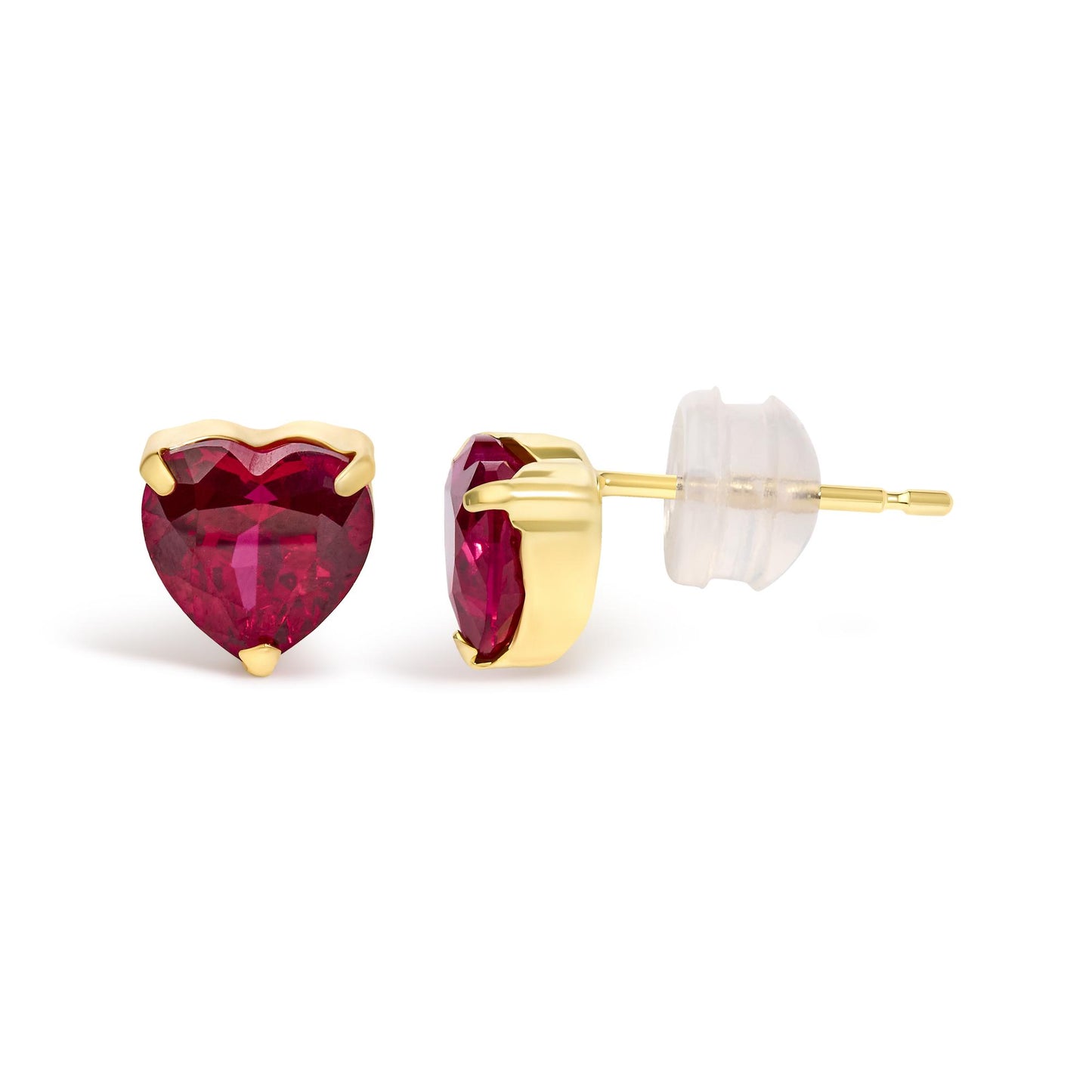 Close-up front and side views of yellow metal earrings with heart-shaped red gemstones in a three-prong setting, shown against a white background.