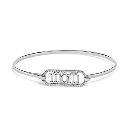 White bracelet with a hexagonal centerpiece featuring the word 'mom' surrounded by small white gemstones, shown from a front angle on a white background.