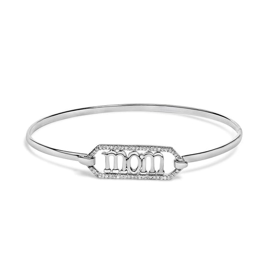 White bracelet with a hexagonal centerpiece featuring the word 'mom' surrounded by small white gemstones, shown from a front angle on a white background.