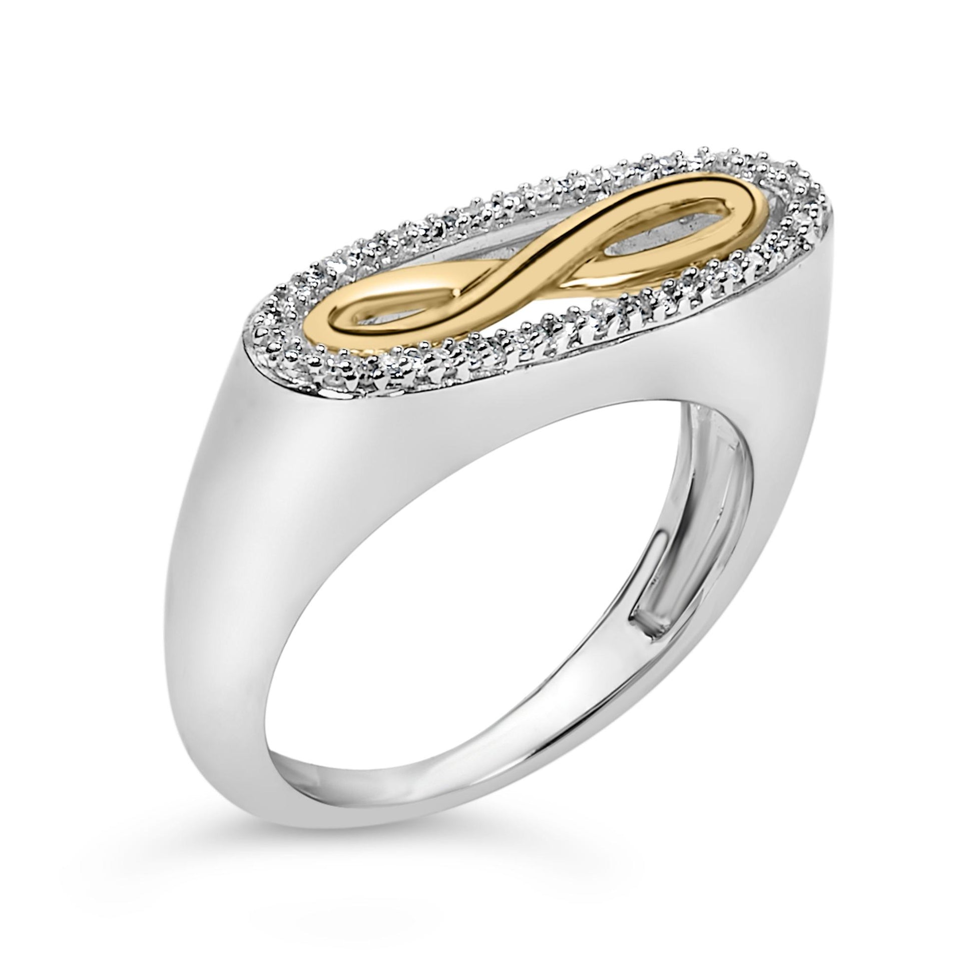 Close-up angled view of a ring with a white metal band. The top features an oval-shaped design with a yellow metal infinity symbol in the center, surrounded by a border of small white gemstones in a shared prong setting.
