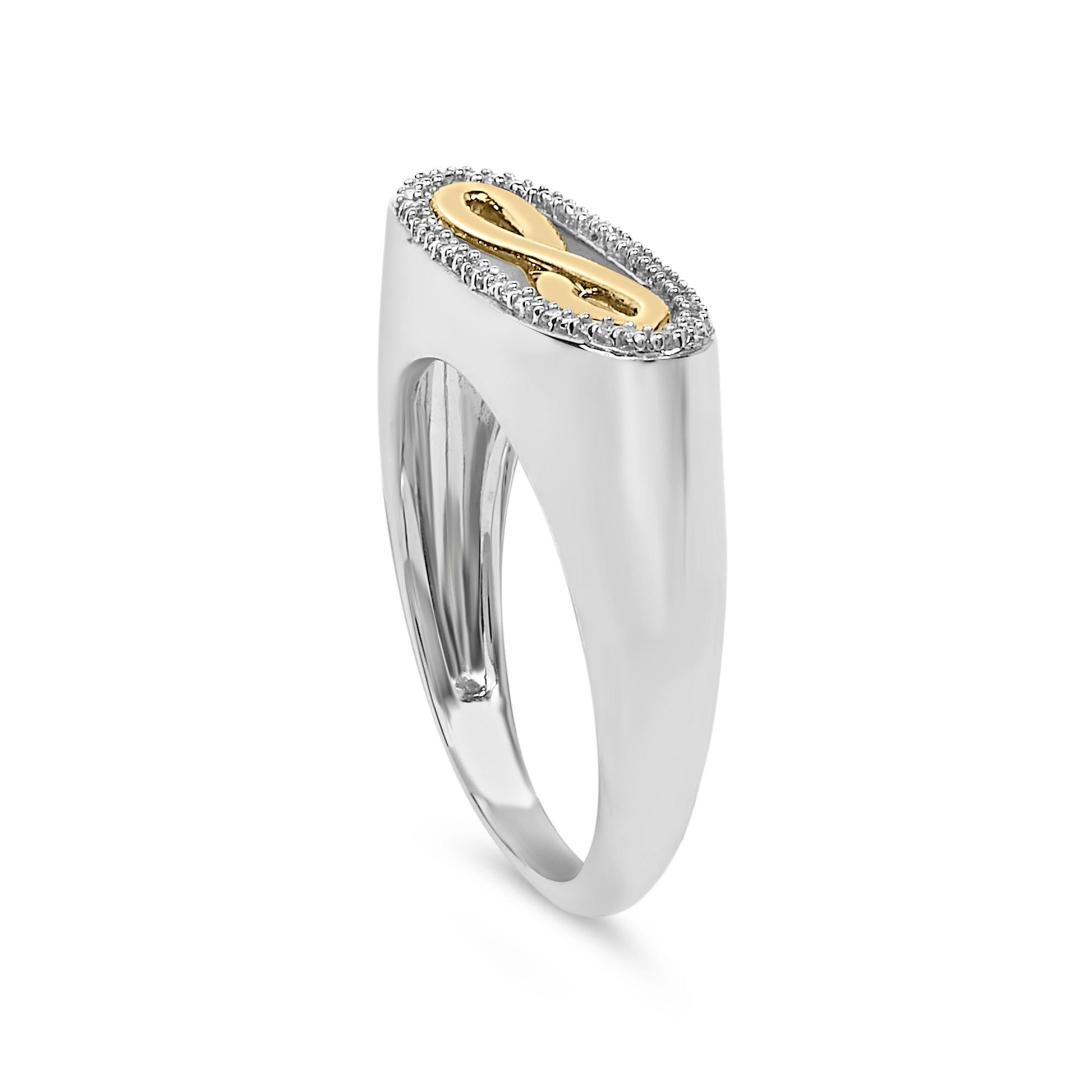 Close-up front angled view of a ring with a rectangular top featuring a yellow metal infinity symbol surrounded by small white gemstones, set on a smooth white metal band.