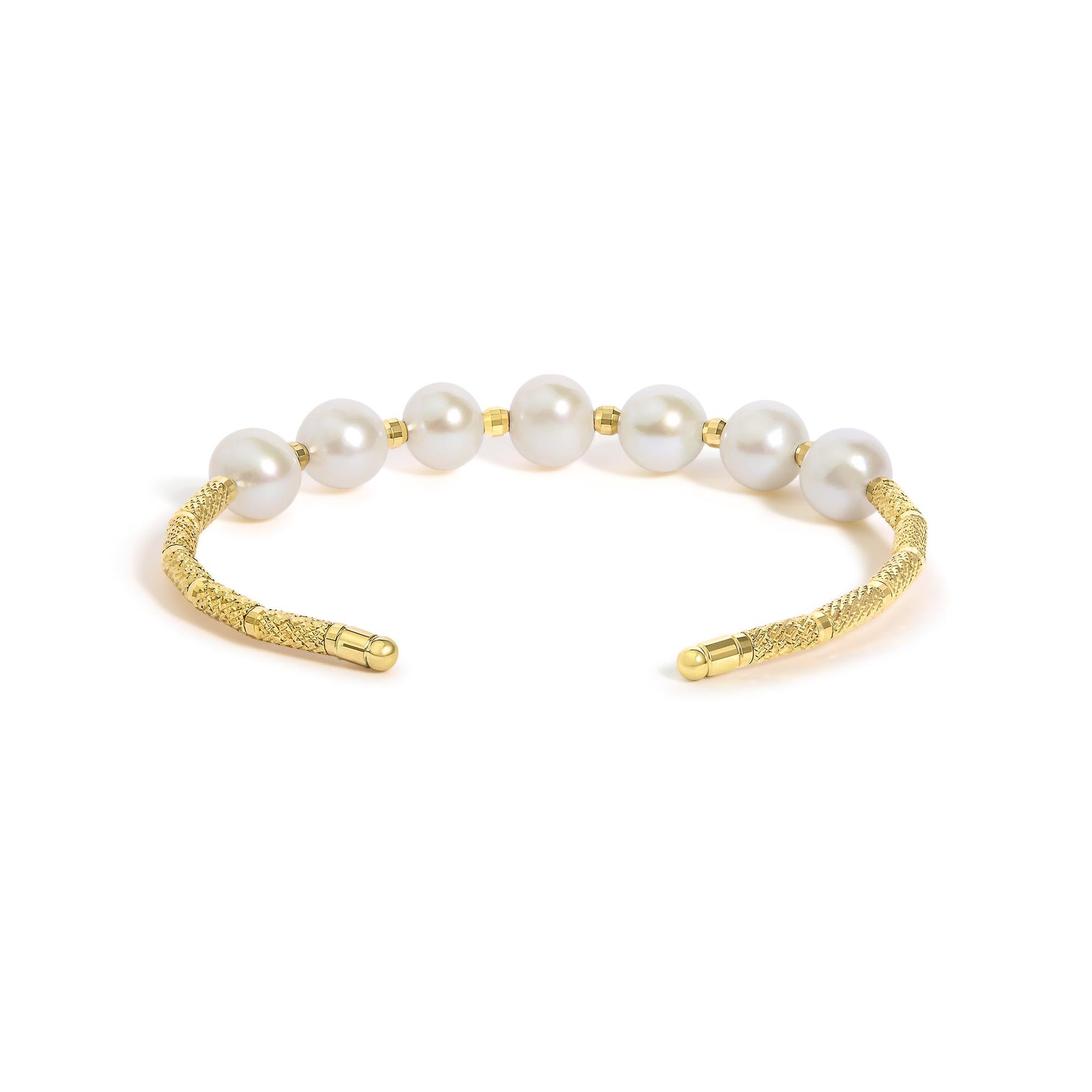 Close-up front angle of a yellow metal bracelet featuring a textured band and large white gemstones evenly spaced along the top.