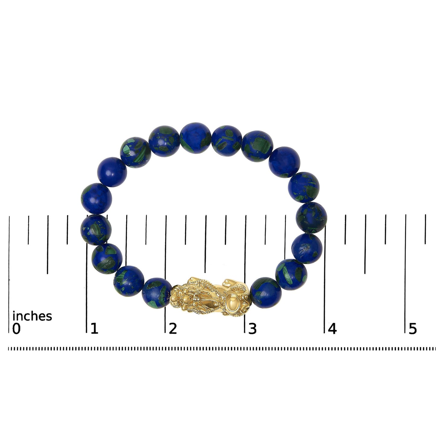 Close-up front view of a yellow metal bracelet with round blue and green gemstones in a drilled setting, shown on a scale.