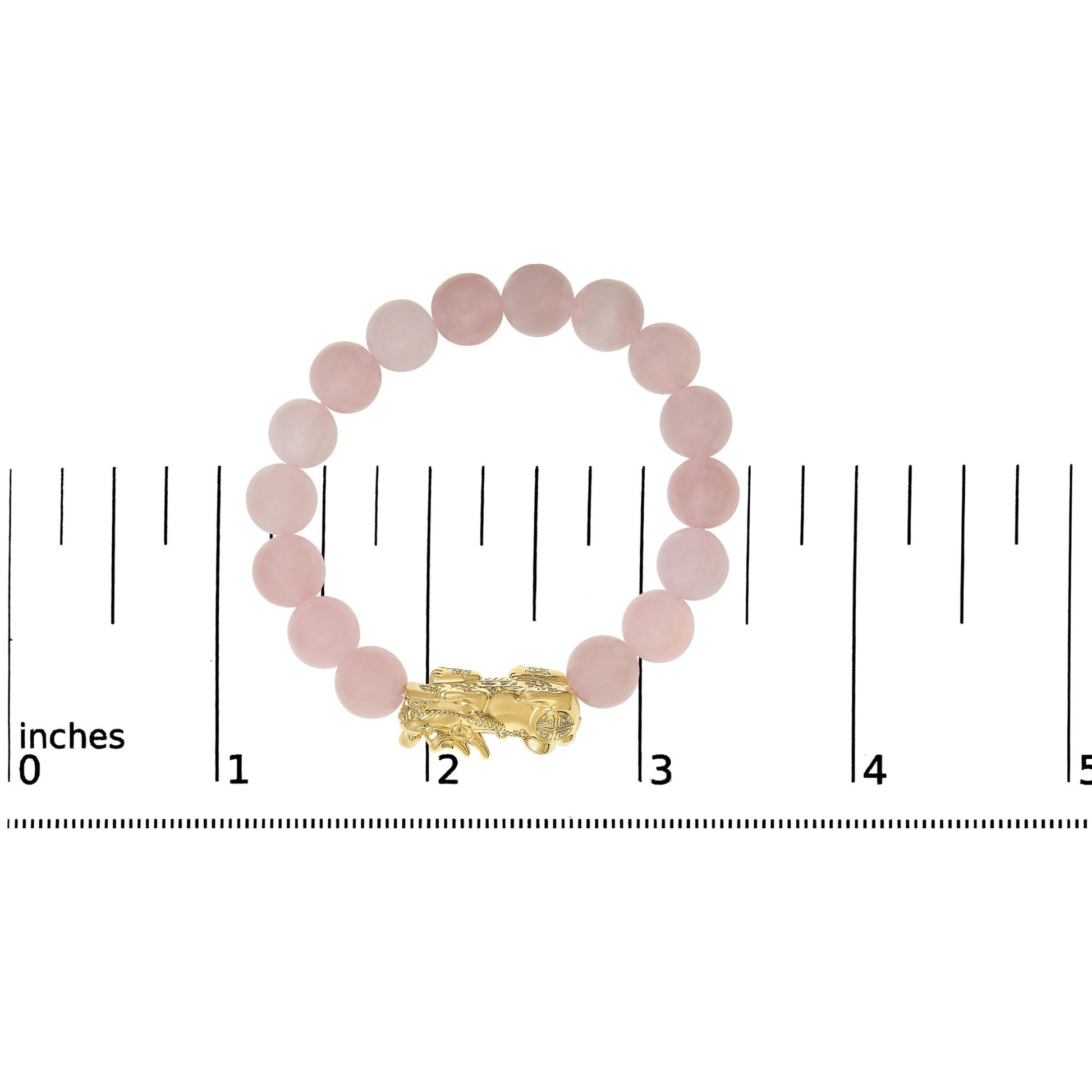 Bracelet with round pink gemstones and a yellow metal clasp, shown flat on a scale from a top-down angle.