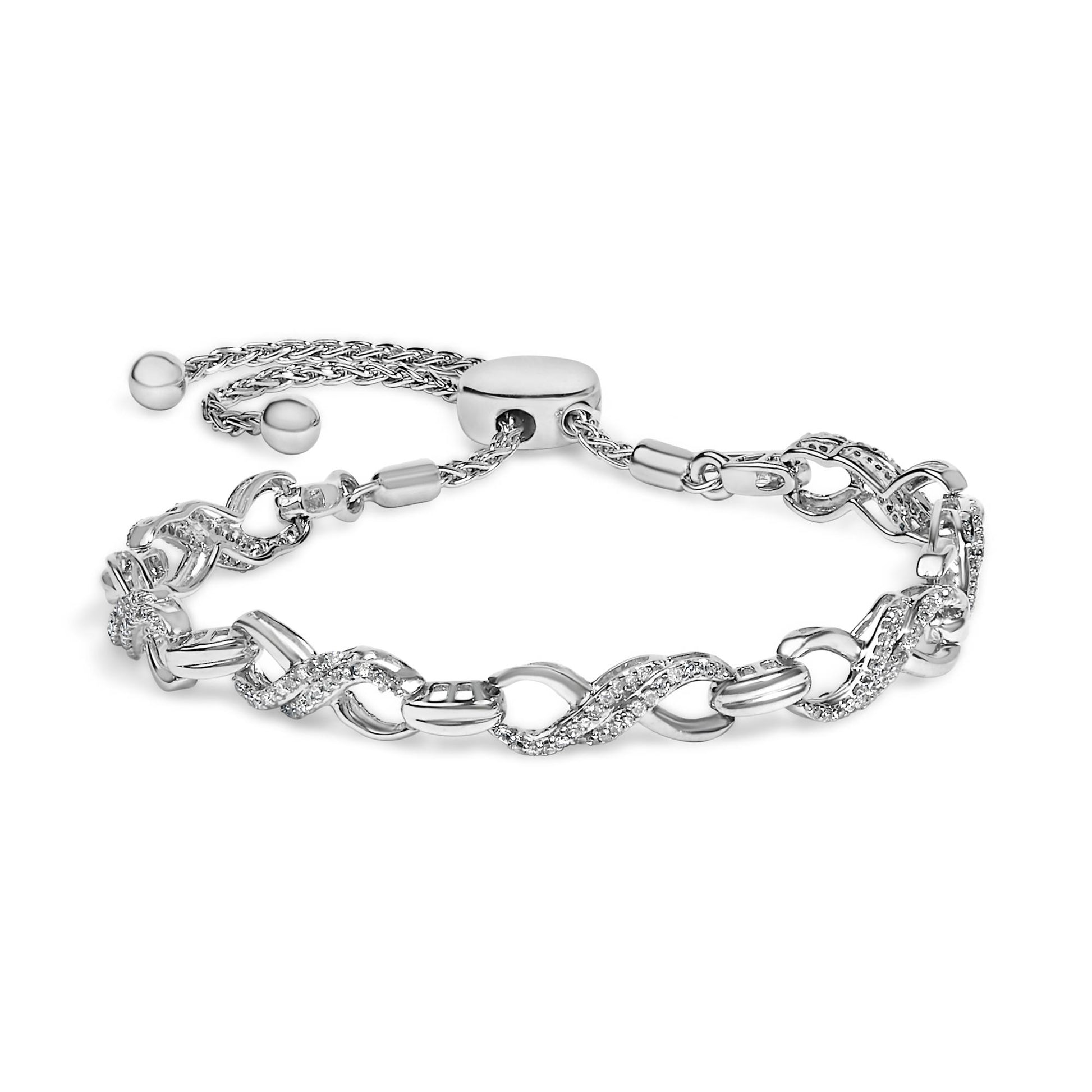 White metal bracelet with interlocking twisted links, each adorned with small round white gemstones, shown in a close-up angled view.