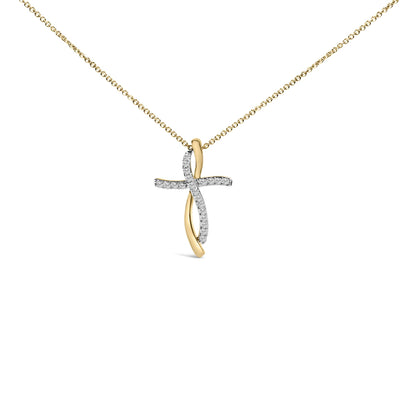 Front angled view of a yellow and white metal necklace with a cross pendant featuring round white gemstones in prong settings.