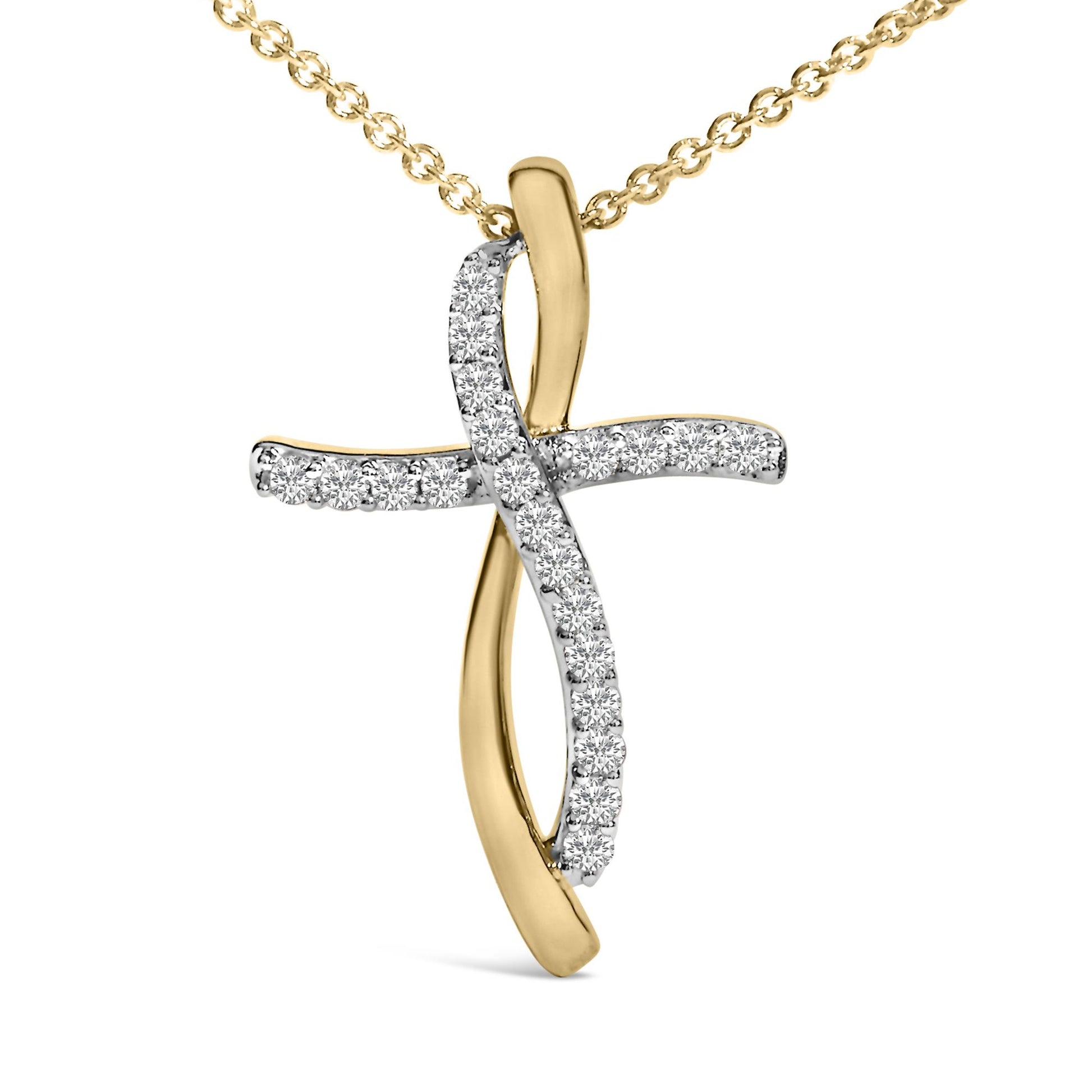 Close-up front view of a two-tone necklace pendant in a curved cross shape, featuring white round gemstones in prong settings along one curved arm and a smooth yellow metal curved arm.