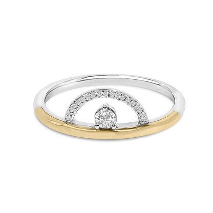 Close-up front view of a two-tone ring featuring a central round white gemstone in a three-prong setting, accented by a semicircle of smaller round white gemstones in a shared prong setting on the upper half.