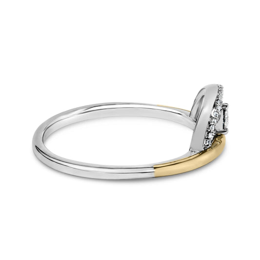 Side angle view of a two-tone ring featuring a thin band with white and yellow metal colors, a single round white gemstone in 3-prong setting, and a halo of smaller round white gemstones in shared prong setting.