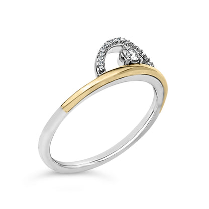 Close-up angled view of a ring with a split shank featuring yellow and white metal colors, a single round white gemstone in a three-prong setting, and a curved row of smaller round white gemstones in shared prong settings.