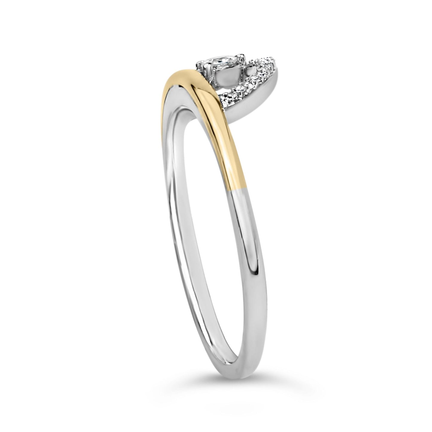Close-up front angle of a two-tone ring with white and yellow metals, featuring one round white gemstone in a three-prong setting and a curved row of round white gemstones in shared prong settings.