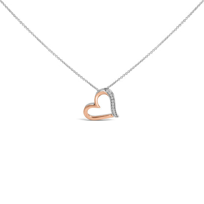 Front view of a heart-shaped necklace pendant with rose-colored and white sections, the white section adorned with round white gemstones in a pave setting, shown on a chain against a white background.