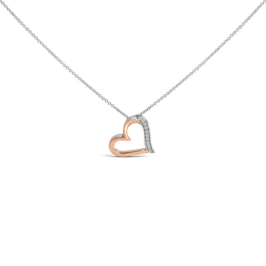 Front view of a heart-shaped necklace pendant with rose-colored and white sections, the white section adorned with round white gemstones in a pave setting, shown on a chain against a white background.