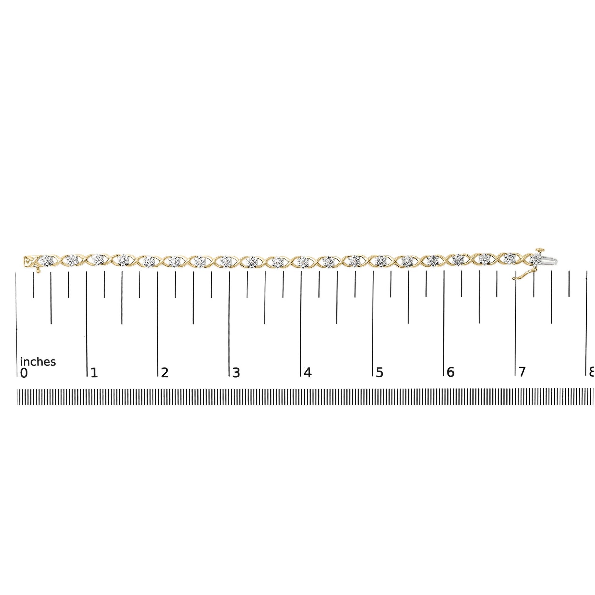 Bracelet with alternating yellow and white metal links, each set with round white gemstones in prong settings, shown flat on a scale from 0 to 8 inches, shot from above.