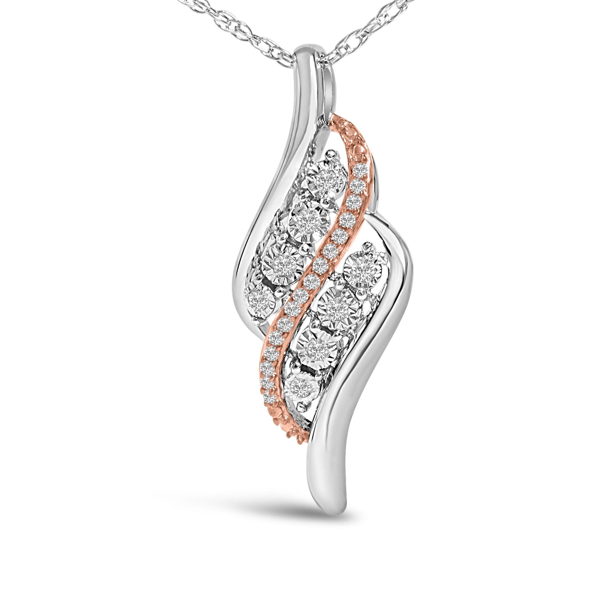 Close-up front angle of a necklace pendant featuring intertwined white and rose metal curves, adorned with round white gemstones in prong settings along the rose metal curve.