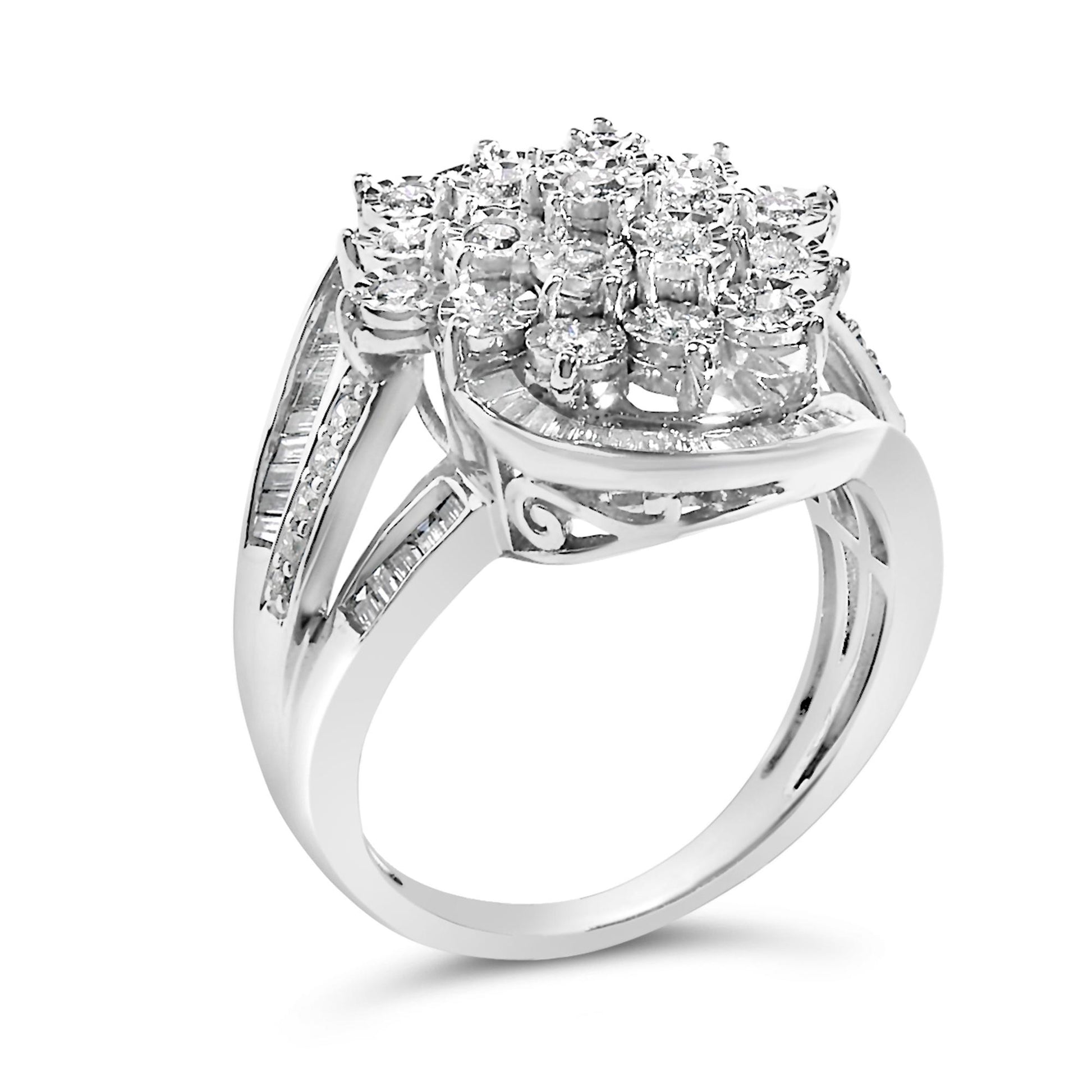 White metal ring with a raised cluster of round white gemstones in the center, surrounded by a border of baguette-shaped white gemstones in a channel setting, shown at an angled close-up view.