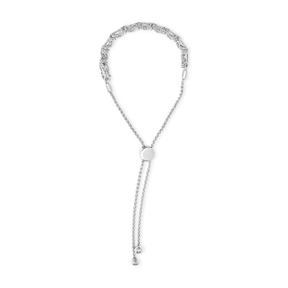 White metal adjustable bracelet shown from a top-down angle, featuring a section with channel-set round white gemstones and a sliding round clasp with two dangling chain ends.